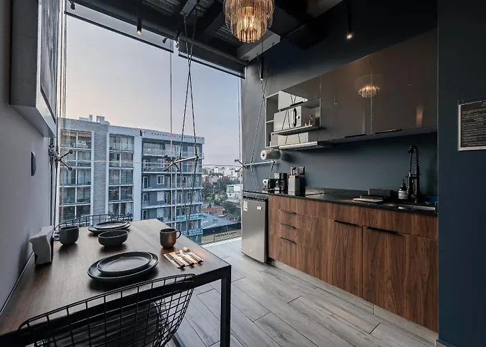 The Skyline Loft Modern Comfort With Stunning City Views